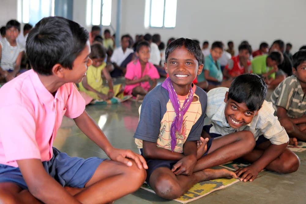 Children enjoy their Food for People meal in Bantoli, India