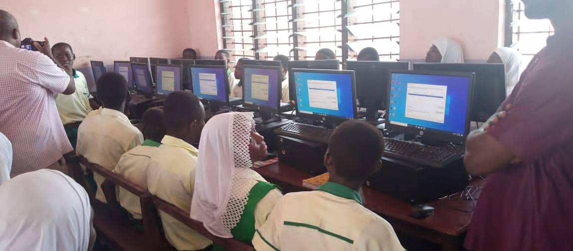 Male and Female students at Aisha Bintu School in Ghana attend class in new computer lab made possible by The Prem Rawat Foundation