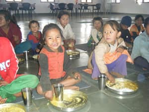 Enjoying a hot meal at FFP facility, Nepal