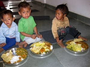 3 boy eating