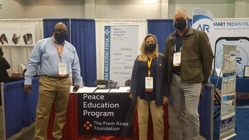 APPA members visiting the Peace Education Program booth