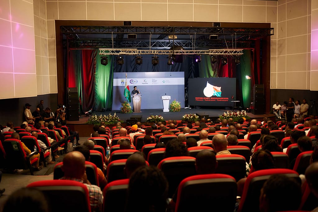 Madagascar President Andry Nirina Rajoelina speaks after Prem Rawat