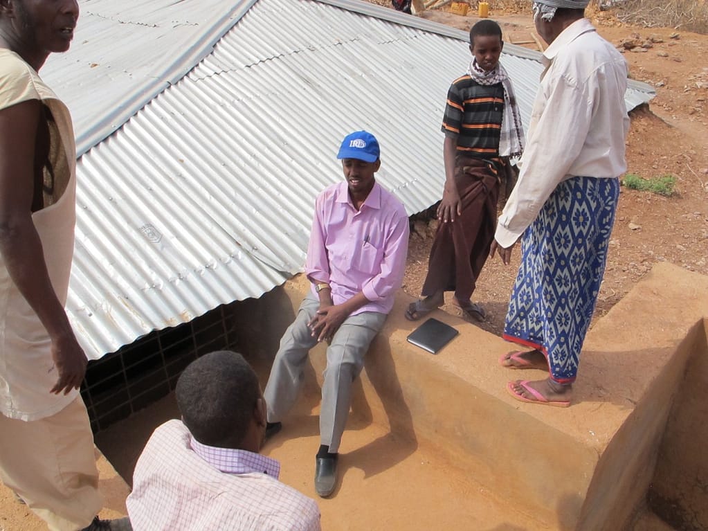IRD Emergency Relief Coordinator Listens to Bangol Villagers