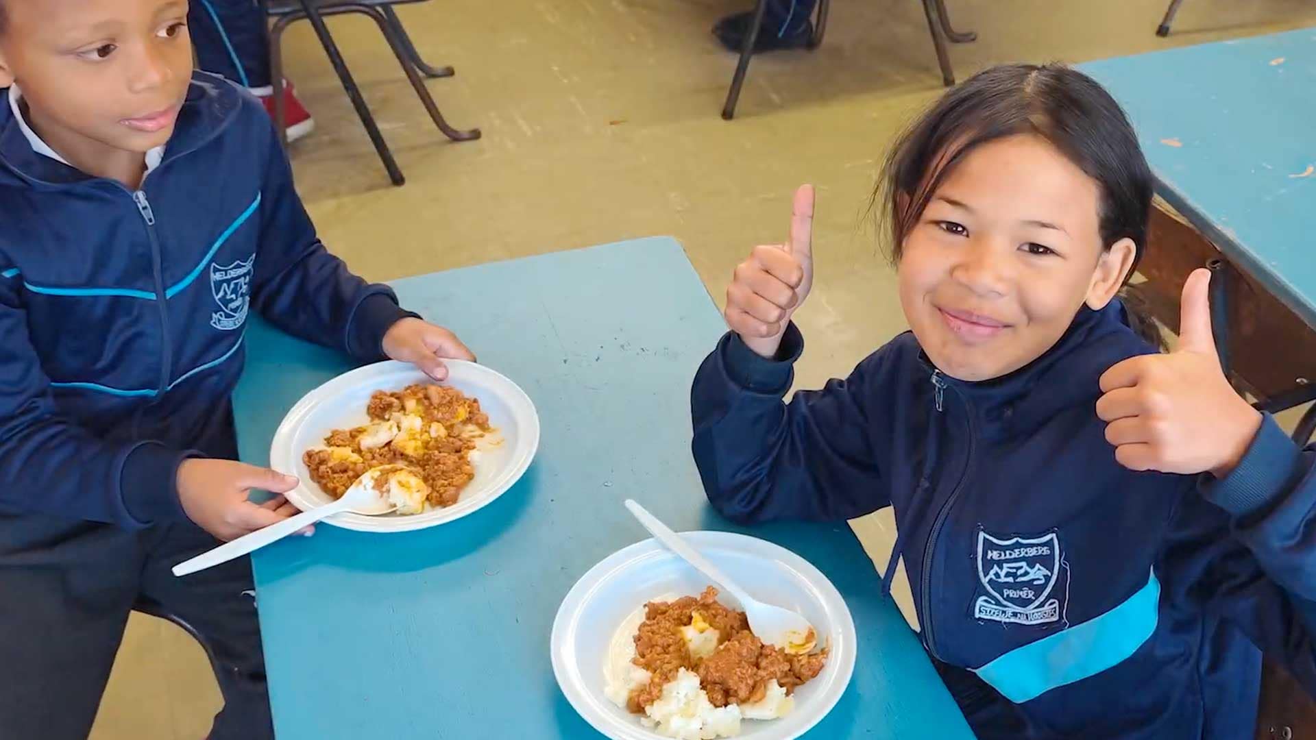Renovations at Food for People South Africa are enabling more children to be fed like those pictured here.