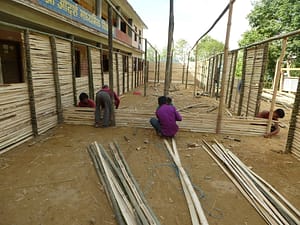 Volunteers helped build temporary classrooms after school buildings were damaged by the earthquake.