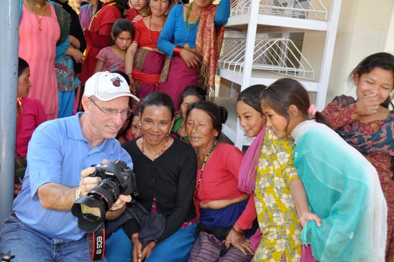 Bruce Keenan (left) Having Fun With Villagers