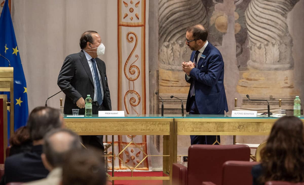 Senator Arnaldo Lomuti and Piero Scutari hold the MOU to bring the Peace Education Program to Italian correctional facilities