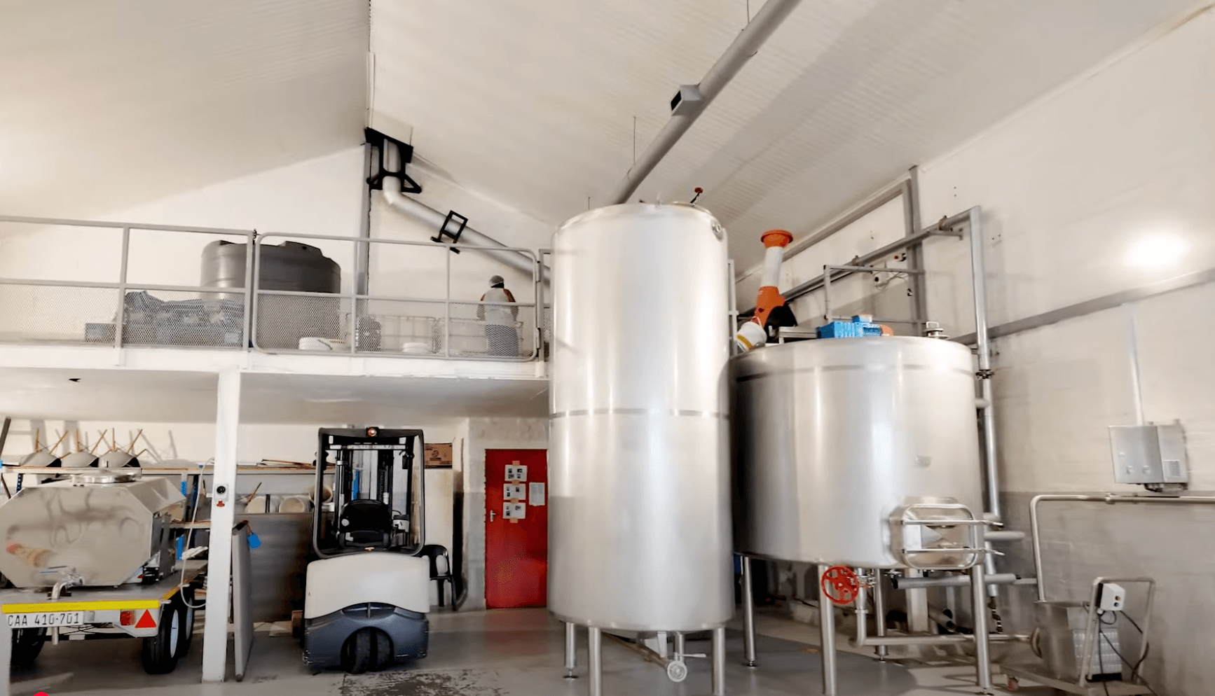 Huge vats for cooking the food and the forklift required to lift the crates of food to the top.